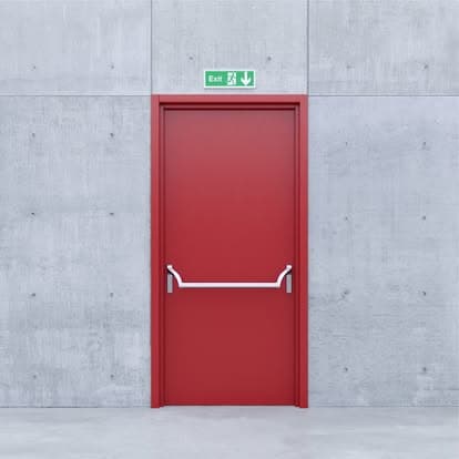 Red fire-exit door installation